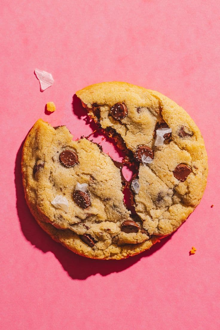 Stack of rich chocolate cookies on a brown backdrop